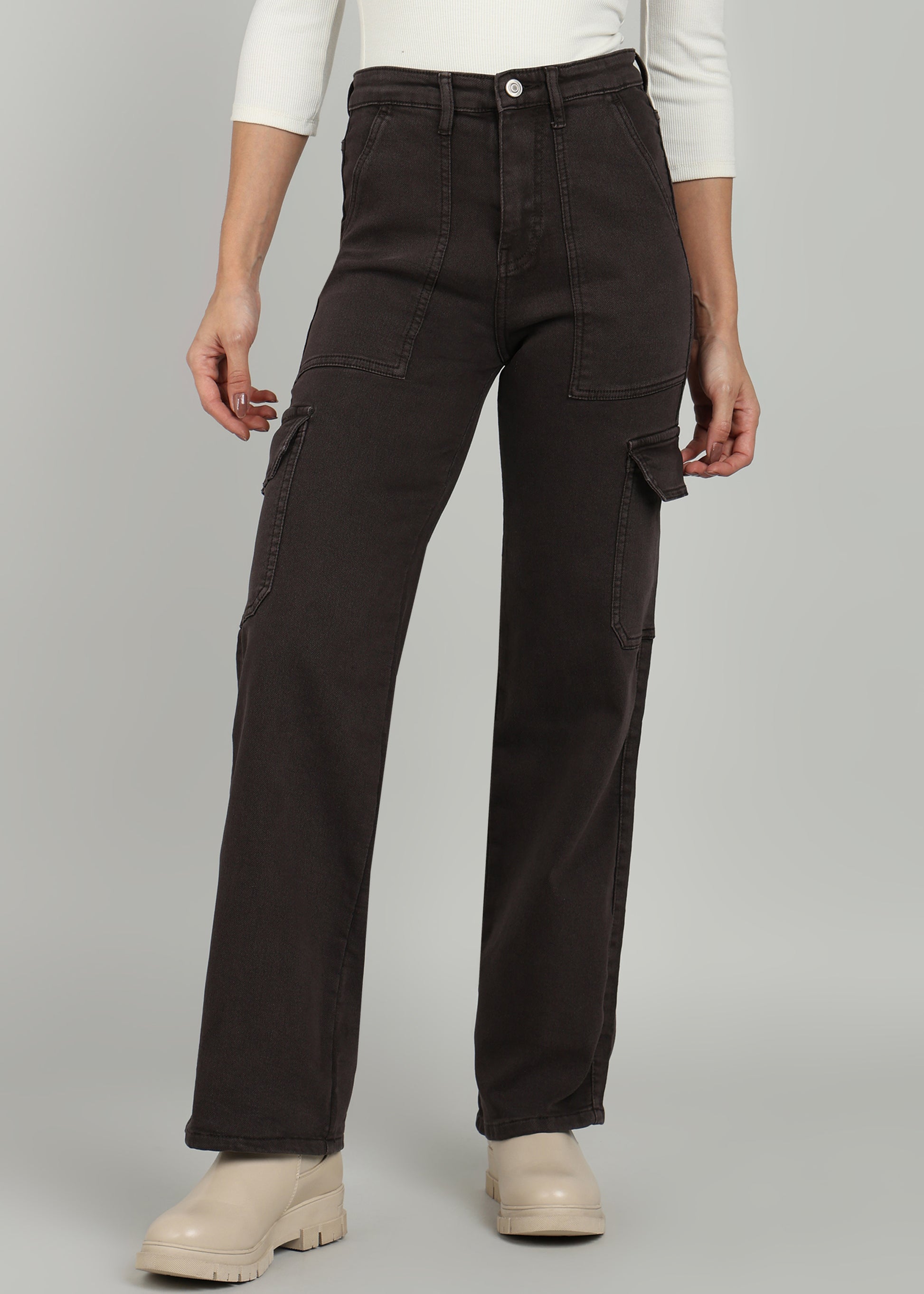Close-up view of black cargo pants from OMG Jeans, featuring multiple pockets and a stylish high-waisted design, paired with a white top and beige boots.
Close-up view of black cargo pants from OMG Jeans, featuring multiple pockets and a stylish high-waisted design, paired with a white top and beige boots.
Close-up view of black cargo pants from OMG Jeans, featuring multiple pockets and a stylish high-waisted design, paired with a white top and beige boots.
